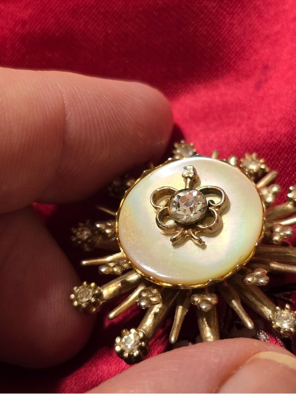 Gold-Tone Sunburst Brooch with Iridescent Mother-of-Pearl and Clear Crystal - Picture 2 of 6